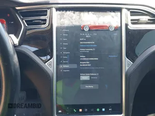 2014 Tesla Model S 60 with VIN 5YJSA1H11EFP37791, listed as a IAAI auction lot 41995504 with 84,371 mi miles and . Bid and sale history available at DreamBid. Image 18.