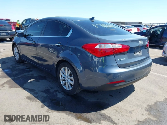 2014 Kia Forte EX with VIN KNAFX4A84E5112910, listed as a IAAI auction lot 42039761 with 118,126 mi miles. Bid and sale history available at carsss.com. Image 3.