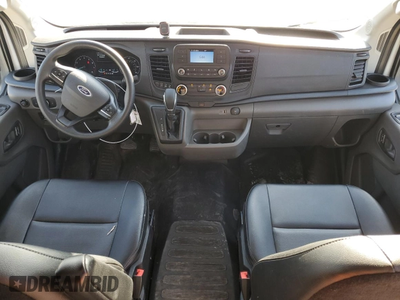 2023 Ford Transit Cargo z VIN 1FTBR2C8XPKC00992, wystawiony jako Copart lot #73199944 z przebiegiem 31 891 mil mil oraz Czysty tytuł • Clean title. Historia ofert i sprzedaży dostępna na DreamBid. Obrazek 8.