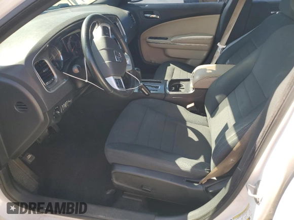2013 Dodge Charger SE with VIN 2C3CDXBG8DH677551, listed as a Copart auction lot 53260735 with 124,248 mi miles and Salvage Title. Bid and sale history available at DreamBid. Image 7.