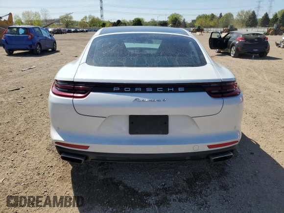 2018 Porsche Panamera с VIN WP0AA2A73JL105480, выставлен на аукционе Copart как лот 55964625 с пробегом 28 269 миль миль и Списание • Salvage title. История ставок и продаж доступна на DreamBid. Изображение 6.