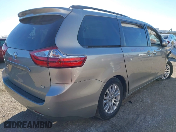2015 Toyota Sienna XLE with VIN 5TDYK3DC8FS547056, listed as a IAAI auction lot 41387793 with 140,767 mi miles and . Bid and sale history available at DreamBid. Image 4.