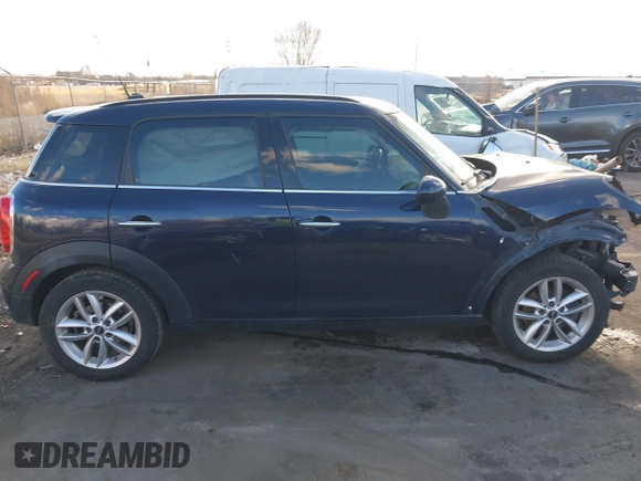 2013 MINI Countryman S with VIN WMWZC3C52DWP21475, listed as a IAAI auction lot 41215334 with 124,365 mi miles and . Bid and sale history available at DreamBid. Image 14.