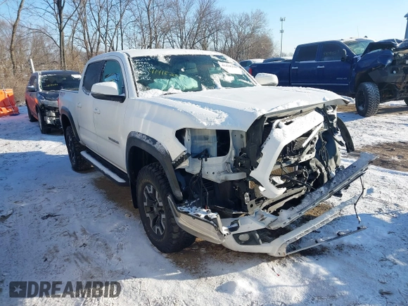 2016 Toyota Tacoma SR with VIN 3TMCZ5AN1GM033770, listed as a IAAI auction lot 41418290 with 122,000 mi miles. Bid and sale history available at carsss.com. Image 1.