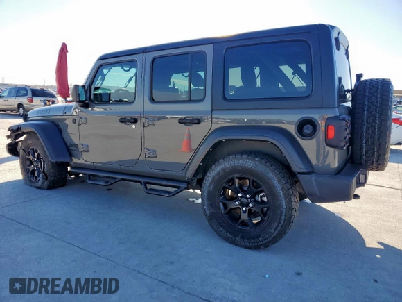 2021 Jeep Wrangler Unlimited Sport S with VIN 1C4HJXDG4MW699376, listed as a Copart auction lot 47202615 with 57,192 mi miles and Salvage Title. Bid and sale history available at DreamBid. Image 2.