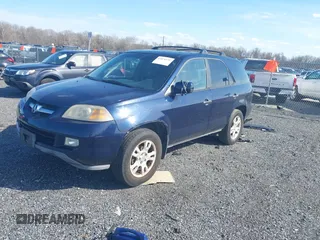 2004 Acura MDX Touring Pkg w/Navigation with VIN 2HNYD18834H523502, listed as a IAAI auction lot 41876131 with 150,886 mi miles. Bid and sale history available at carsss.com. Image 2.