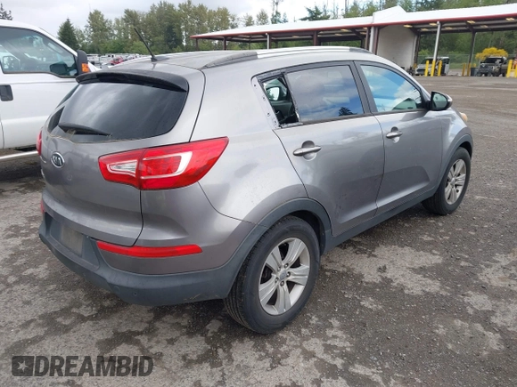2012 Kia Sportage LX with VIN KNDPB3A22C7262656, listed as a IAAI auction lot 42301331 with 180,743 mi miles and . Bid and sale history available at DreamBid. Image 4.