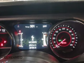 2021 Jeep Gladiator Mojave z VIN 1C6JJTEG5ML524829, wystawiony jako IAAI lot #42247982 z przebiegiem 20 158 mil mil oraz . Historia ofert i sprzedaży dostępna na DreamBid. Obrazek 7.