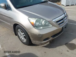 2005 Honda Odyssey EX-L z VIN 5FNRL38615B407908, wystawiony jako IAAI lot #42076045 z przebiegiem 170 950 mil mil oraz . Historia ofert i sprzedaży dostępna na DreamBid. Obrazek 12.