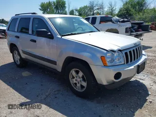 2005 Jeep Grand Cherokee Laredo z VIN 1J4GR48K95C651483, wystawiony jako IAAI lot #42678360 z przebiegiem 114 674 mil mil oraz . Historia ofert i sprzedaży dostępna na DreamBid. Obrazek 1.