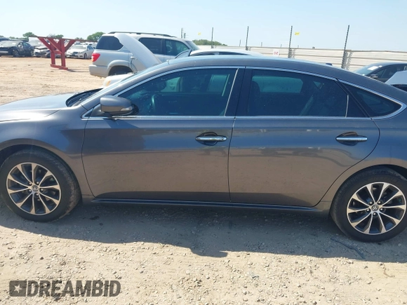 2018 Toyota Avalon XLE with VIN 4T1BK1EB1JU285770, listed as a IAAI auction lot 42073553 with 71,809 mi miles and . Bid and sale history available at DreamBid. Image 14.