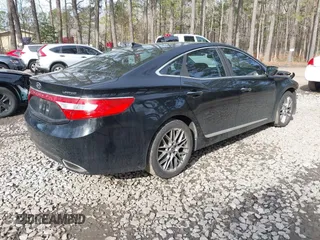 2014 Hyundai Azera Limited with VIN KMHFH4JG0EA368973, listed as a IAAI auction lot 41656545 with 108,631 mi miles and . Bid and sale history available at carsss.com. Image 4.