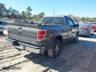 2014 Ford F-150 XL with VIN 1FTMF1CM3EFC57890, listed as a IAAI auction lot 41908369 with 228,743 mi miles. Bid and sale history available at carsss.com. Image 4.