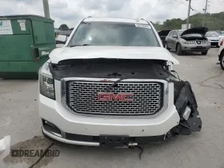 2016 GMC Yukon Denali with VIN 1GKS2CKJ0GR457895, listed as a Copart auction lot 63248354 with 118,005 mi miles and Salvage Title. Bid and sale history available at carsss.com. Image 5.