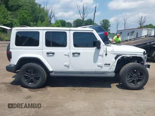 2021 Jeep Wrangler Unlimited Sahara with VIN 1C4HJXEN1MW618508, listed as a IAAI auction lot 42639515 with 39,747 mi miles and . Bid and sale history available at DreamBid. Image 13.