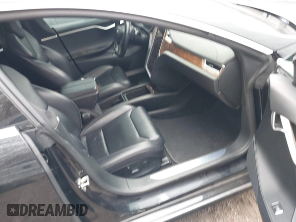 2017 Tesla Model S 100D with VIN 5YJSA1E25HF215778, listed as a IAAI auction lot 41692605 with Not Provided miles and . Bid and sale history available at DreamBid. Image 5.