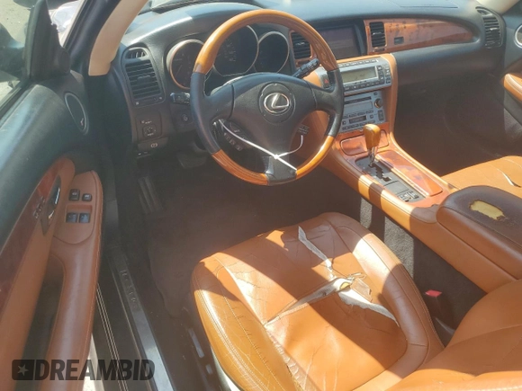 2002 Lexus SC 430 with VIN JTHFN48YX20026264, listed as a Copart auction lot 52571945 with 170,019 mi miles and Salvage Title. Bid and sale history available at DreamBid. Image 8.