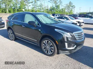 2017 Cadillac XT5 Premium Luxury FWD z VIN 1GYKNCRS1HZ233242, wystawiony jako IAAI lot #42045874 z przebiegiem Nie podano mil oraz . Historia ofert i sprzedaży dostępna na DreamBid. Obrazek 1.