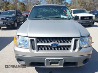 2005 Ford Explorer Sport Trac XLS z VIN 1FMZU67K75UA18027, wystawiony jako IAAI lot #41694106 z przebiegiem 144 900 mil mil oraz . Historia ofert i sprzedaży dostępna na DreamBid. Obrazek 6.