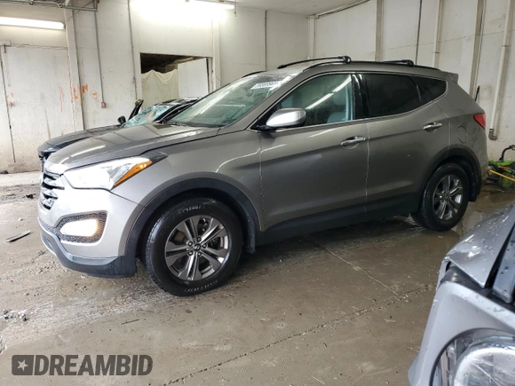 2014 Hyundai Santa Fe with VIN 5XYZU3LB1EG227984, listed as a Copart auction lot 59569905 with 102,477 mi miles and Salvage title. Bid and sale history available at DreamBid. Image 1.