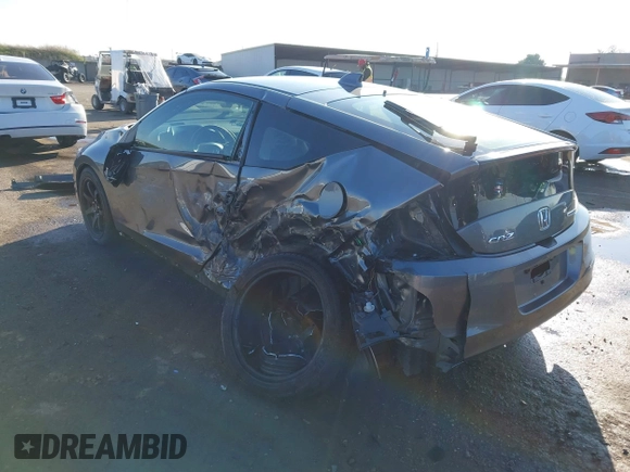 2015 Honda CR-Z EX with VIN JHMZF1C62FS002209, listed as a IAAI auction lot 41291326 with 73,301 mi miles and . Bid and sale history available at DreamBid. Image 3.