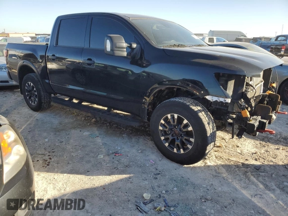 2024 Nissan Titan Pro-4X with VIN 1N6AA1ED5RN101017, listed as a Copart auction lot 43777785 with 30,489 mi miles and Salvage title. Bid and sale history available at DreamBid. Image 4.
