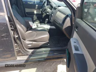2009 Mercury Mariner Premier z VIN 4M2CU977X9KJ10414, wystawiony jako IAAI lot #41880499 z przebiegiem 175 988 mil mil oraz . Historia ofert i sprzedaży dostępna na DreamBid. Obrazek 5.