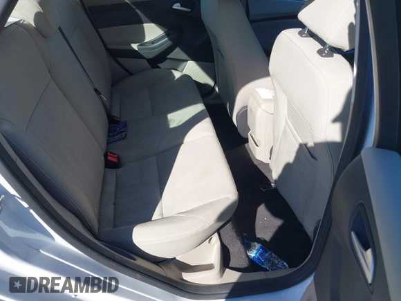 2017 Ford Focus SE with VIN 1FADP3F2XHL274975, listed as a IAAI auction lot 38283193 with 77,832 mi miles and . Bid and sale history available at DreamBid. Image 8.