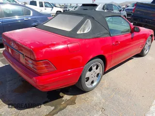 1999 Mercedes-Benz SL-Class with VIN WDBFA68F6XF177239, listed as a IAAI auction lot 41837553 with 138,715 mi miles. Bid and sale history available at carsss.com. Image 4.