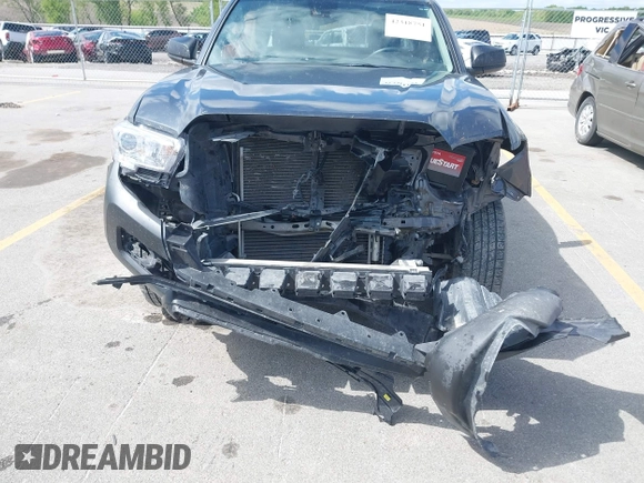 2019 Toyota Tacoma SR with VIN 5TFSX5EN4KX070181, listed as a IAAI auction lot 42318751 with 68,334 mi miles and . Bid and sale history available at DreamBid. Image 6.