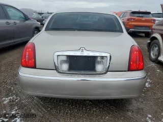 2001 Lincoln Town Car Executive with VIN 1LNHM81W31Y733358, listed as a Copart auction lot 85582644 with 88,418 mi miles and Salvage Title. Bid and sale history available at carsss.com. Image 6.