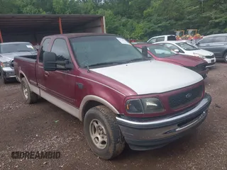 1998 Ford F-150 z VIN 1FTDX1760WNA03084, wystawiony jako IAAI lot #42509039 z przebiegiem 149 482 mil mil oraz . Historia ofert i sprzedaży dostępna na DreamBid. Obrazek 1.