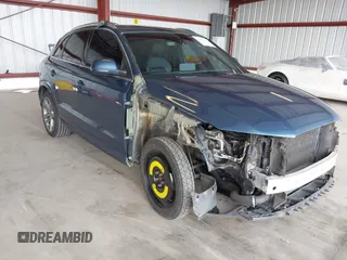 2016 Audi Q3 Prestige z VIN WA1GFCFS8GR020973, wystawiony jako IAAI lot #41923494 z przebiegiem 184 467 mil mil oraz . Historia ofert i sprzedaży dostępna na DreamBid. Obrazek 1.