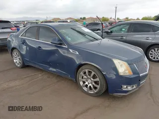 2009 Cadillac CTS RWD w/1SB with VIN 1G6DV57V690111847, listed as a IAAI auction lot 42189418 with 144,790 mi miles. Bid and sale history available at carsss.com. Image 1.