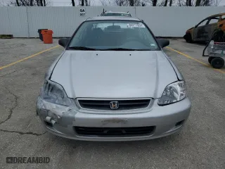 1999 Honda Civic DX with VIN 2HGEJ6446XH100761, listed as a Copart auction lot 84277854 with 82,619 mi miles and Clean Title. Bid and sale history available at carsss.com. Image 5.