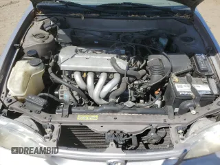 1998 Toyota Corolla VE with VIN 1NXBR18E6WZ080700, listed as a Copart auction lot 58605135 with 214,928 mi miles and Salvage title. Bid and sale history available at DreamBid. Image 11.