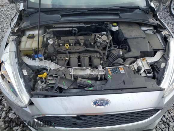 2018 Ford Focus SE z VIN 1FADP3F27JL250591, wystawiony jako Copart lot #54989245 z przebiegiem 85 838 mil mil oraz Szkoda całkowita • Salvage title. Historia ofert i sprzedaży dostępna na DreamBid. Obrazek 11.