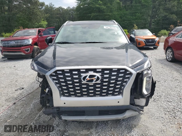 2022 Hyundai Palisade SEL z VIN KM8R44HE2NU418557, wystawiony jako Copart lot #54136245 z przebiegiem 93 800 mil mil oraz Czysty tytuł • Clean title. Historia ofert i sprzedaży dostępna na DreamBid. Obrazek 5.