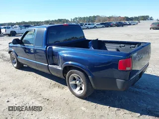 2002 GMC Sonoma SL Fleet with VIN 1GTCS19W128244099, listed as a IAAI auction lot 41090001 with 153,048 mi miles. Bid and sale history available at carsss.com. Image 3.