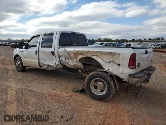 2001 Ford F-350 XL with VIN 1FTWW32F81EC66012, listed as a Copart auction lot 48225834 with 141,971 mi miles and Salvage title. Bid and sale history available at DreamBid. Image 2.