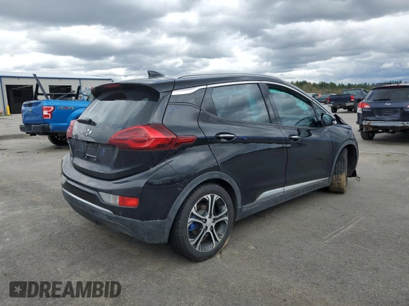 2018 Chevrolet Bolt EV Premier with VIN 1G1FX6S09J4122445, listed as a Copart auction lot 55230635 with 33,569 mi miles and Salvage title. Bid and sale history available at DreamBid. Image 3.