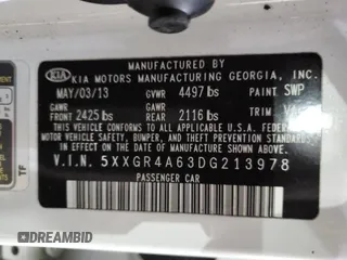 2013 Kia Optima SX with VIN 5XXGR4A63DG213978, listed as a Copart auction lot 88746435 with 154,060 mi miles and Salvage Title. Bid and sale history available at carsss.com. Image 12.