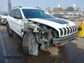 2018 Jeep Cherokee Trailhawk with VIN 1C4PJMBX8JD525945, listed as a IAAI auction lot 41008604 with 111,086 mi miles. Bid and sale history available at carsss.com. Image 1.