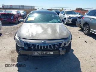 2016 Kia Optima EX with VIN 5XXGU4L31GG106854, listed as a IAAI auction lot 41762052 with 122,121 mi miles. Bid and sale history available at carsss.com. Image 12.