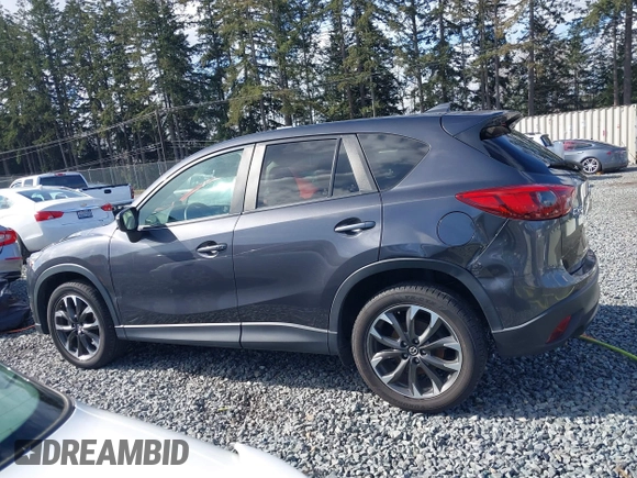 2016 Mazda CX-5 Grand Touring with VIN JM3KE4DY9G0895006, listed as a IAAI auction lot 41703146 with 39,359 mi miles. Bid and sale history available at carsss.com. Image 14.