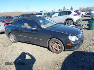 2004 Mercedes-Benz CLK 5.0L with VIN WDBTK75G14T007385, listed as a IAAI auction lot 41421327 with 77,761 mi miles. Bid and sale history available at carsss.com. Image 1.