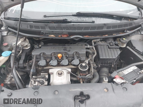2006 Honda Civic LX with VIN 2HGFA16556H520894, listed as a IAAI auction lot 41963736 with 166,682 mi miles and . Bid and sale history available at DreamBid. Image 10.