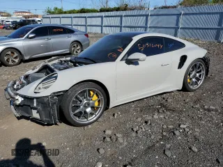 2021 Porsche 911 Turbo S with VIN WP0AD2A9XMS257789, listed as a Copart auction lot 50316044 with 0 mi miles and Salvage Title. Bid and sale history available at carsss.com. Image 1.