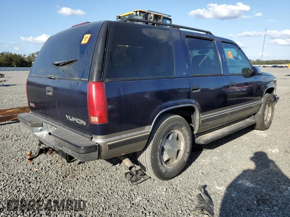 1998 GMC Yukon with VIN 1GKEK13R6WJ706204, listed as a Copart auction lot 77577074 with 186,023 mi miles and Salvage Title. Bid and sale history available at carsss.com. Image 3.