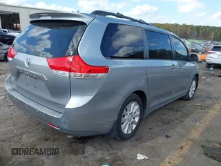 2011 Toyota Sienna XLE AAS with VIN 5TDYK3DC8BS157794, listed as a IAAI auction lot 40759823 with 211,716 mi miles and . Bid and sale history available at DreamBid. Image 4.